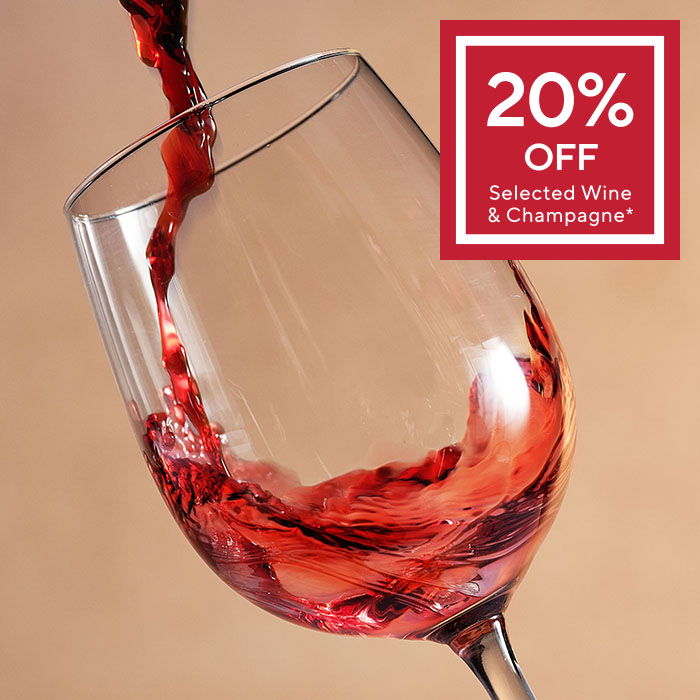 Red wine being poured into a glass