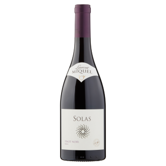 A bottle of Laurent Miquel Solas Pinot Noir. It has a purple cap and elegant white label with black and gold text.