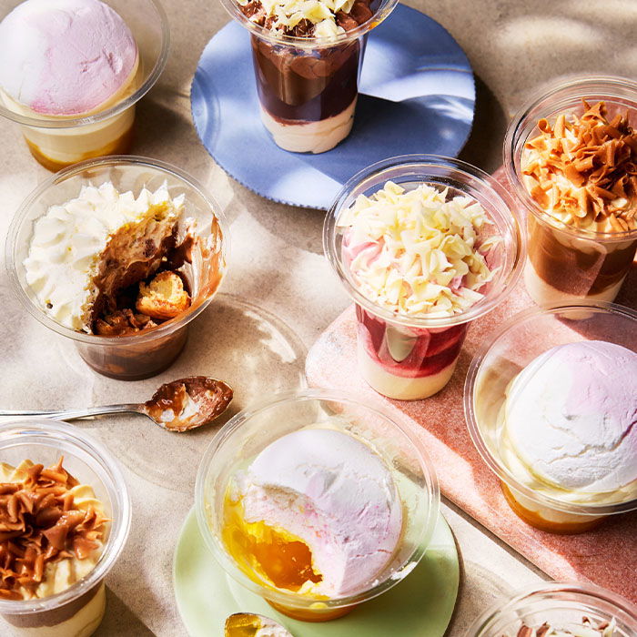 Selection of summer desserts including tarts and fruit-based sweets