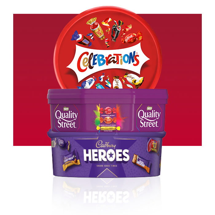Selection of Christmas chocolate tubs including Celebrations, Quality Street and Cadbury Heroes.