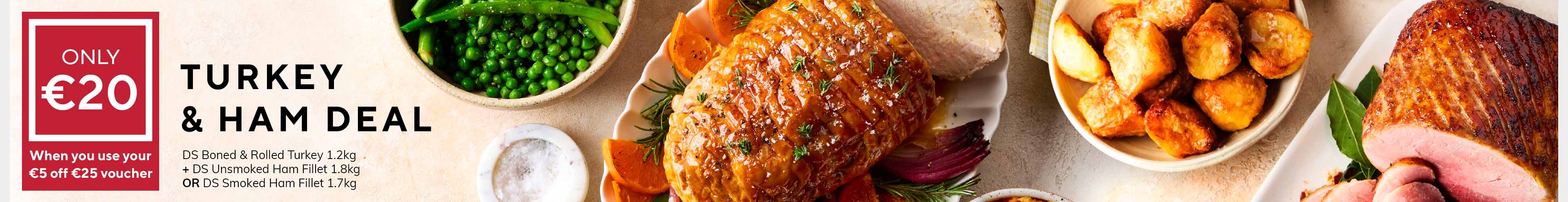 Promotional image for a turkey and ham meal deal priced at €20 when a €5 off €25 voucher is used. The image features a roasted turkey breast, sliced ham, roast potatoes, peas, and stuffing. Offer available from March 31st.