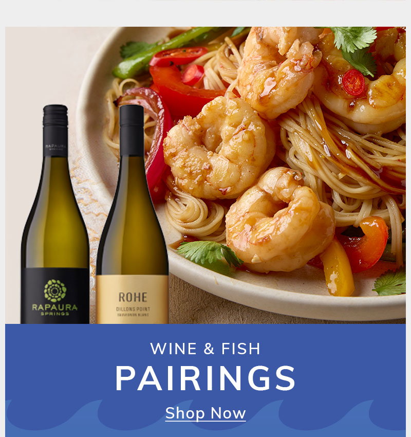 Two wine bottles beside a vibrant shrimp and vegetable noodle dish, featuring a Wine & Fish Pairings banner.