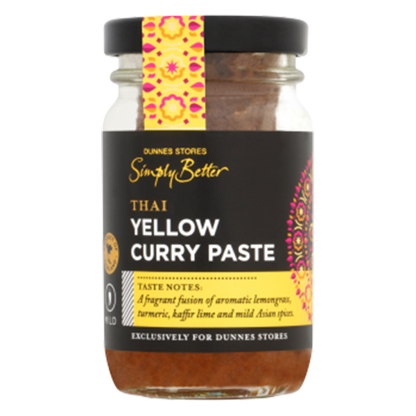 Jar of Dunnes Stores Simply Better Thai Yellow Curry Paste, featuring aromatic lemongrass, turmeric, kaffir lime, and Asian spices.