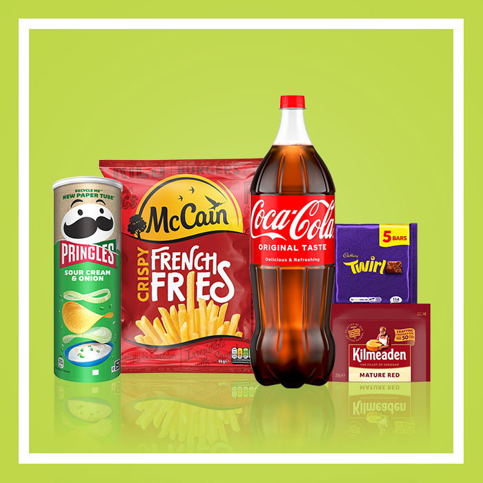 Selection of grocery products including Pringles Sour Cream & Onion crisps, McCain Crispy French Fries, Coca‑Cola Original Taste, Cadbury Twirl bars and Kilmeaden Mature Red cheese on a light green background.