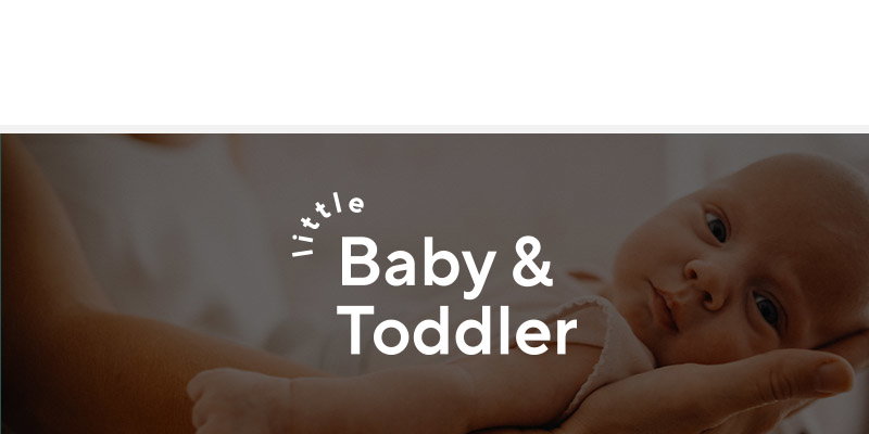 A close-up of a hand gently holding a small baby, with the text 'little Baby & Toddler' prominently displayed.