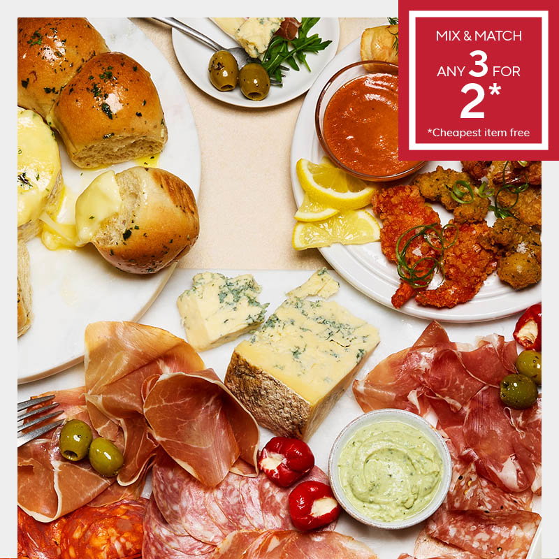 A spread of appetisers featuring cheese, sliced meats, filled bread rolls, olives, and dip. A "Mix & Match 3 for 2" offer is displayed.