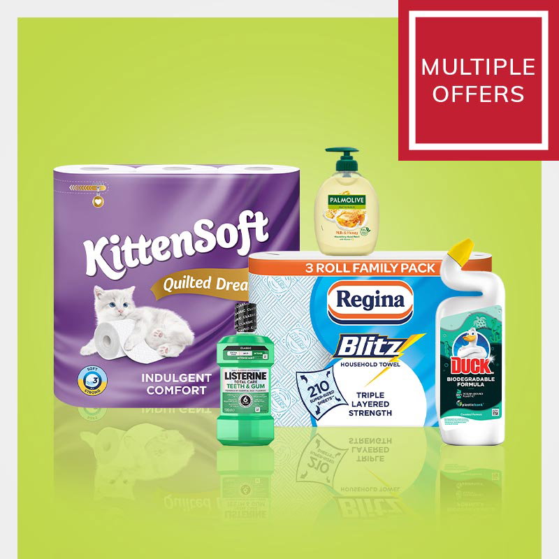 Promotional image showing multiple household offers including KittenSoft quilted toilet tissue, Regina Blitz household towels, Palmolive milk and honey hand wash, Listerine Total Care mouthwash and Duck biodegradable toilet cleaner on a green background.