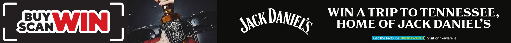 Ad: Promotional banner for Jack Daniel’s featuring ‘Buy Scan Win’, an image of a Jack Daniel’s whiskey bottle being held near a grill, and the text ‘Win a trip to Tennessee, home of Jack Daniel’s’, set against a dark background