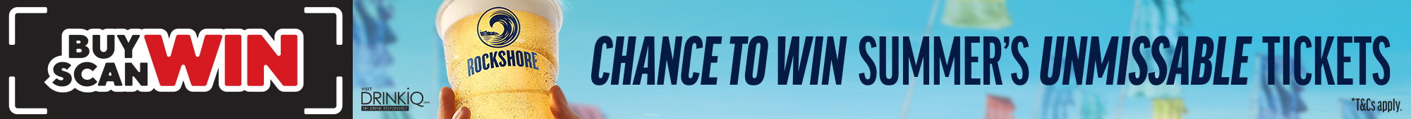 Ad: Rockshore summer promotional banner with Buy Scan Win message, hand holding a pint of Rockshore beer, beach festival background, and text reading Chance to Win Summer’s Unmissable Tickets alongside DrinkIQ responsibility message